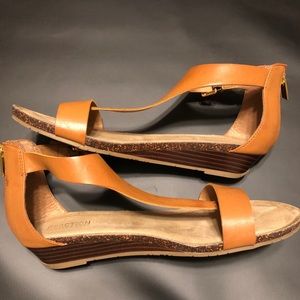 Tan color Reaction Kenneth Cole sandals.